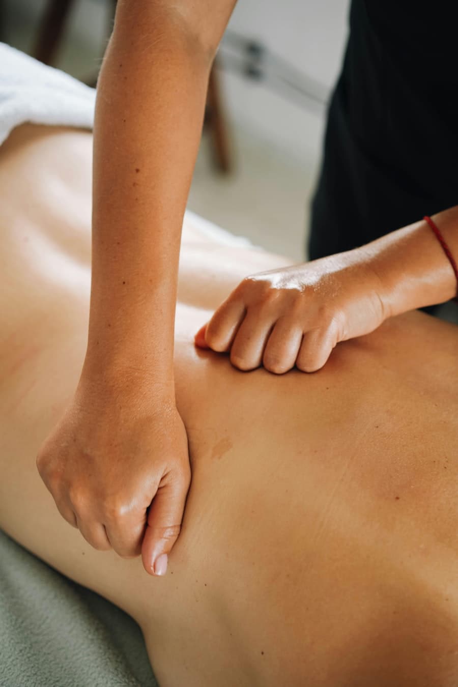 Masaje de espalda descontracturante Espalda Sana